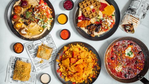 A dinner table with different types of delicious Mexican dishes