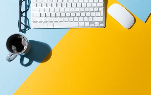 A work table with a blue and yellow background