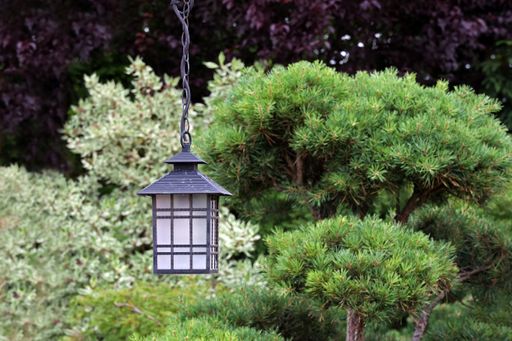 A beautiful lamp hanging in the garden
