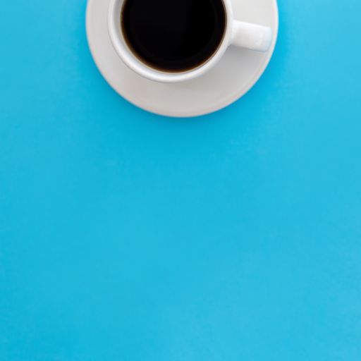 A vertical shot of a mug of coffee isolated on a blue background