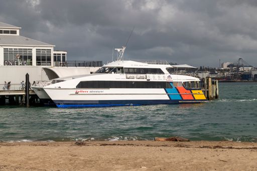 The Fullers Adventurer catamaran commuter ferry at the wharf in Devonport, Auckland, New Zealand