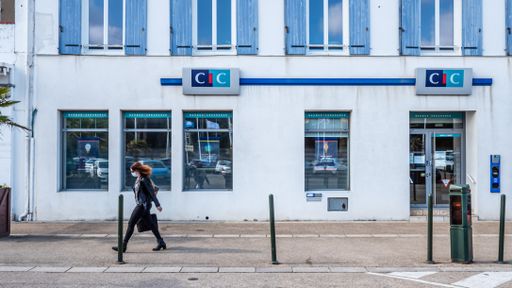 The CIC storefront on a busy road in La Fleche, France