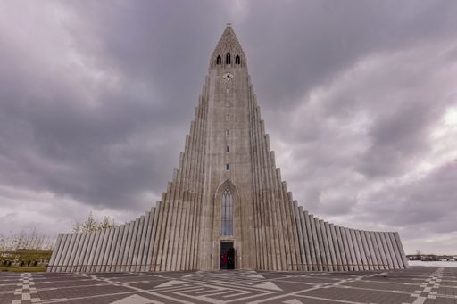 The view of Hallgrimskirkja church in Reykjavik, Iceland, with dramatic clouds in the background