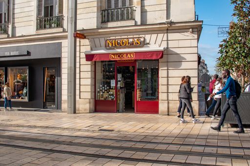 The French Nicolas alcohol storefront on a busy road in Tours, France