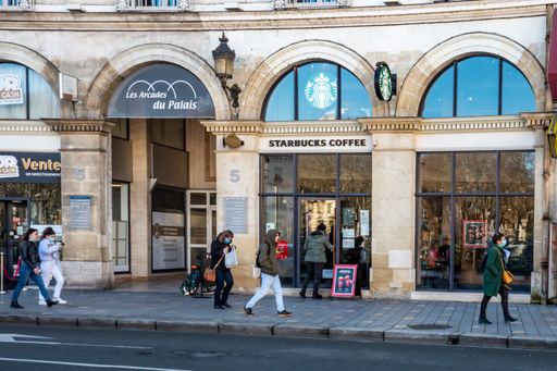 The shop facade of Starbucks coffee shop in Tours, France,