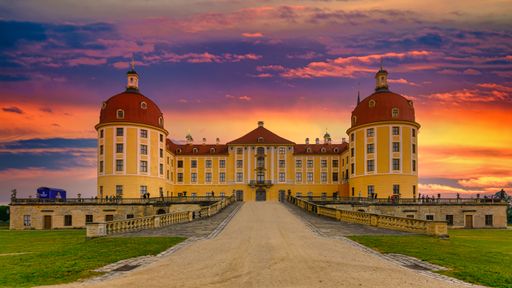 A view of Moritzburg Castle with a beautiful sky