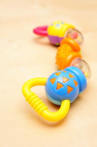 A vertical shot of multicolored children's toys