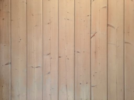 A closeup of a wooden wall texture