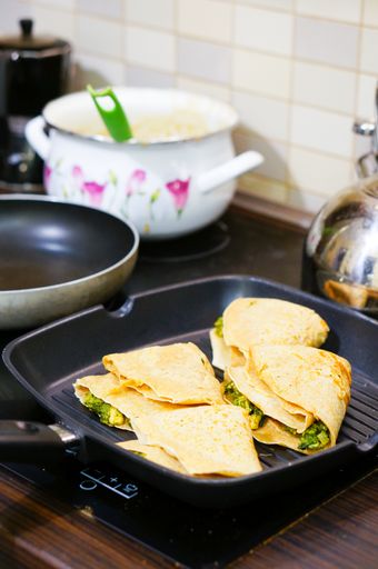 A vertical shot of sandwiches in a pan