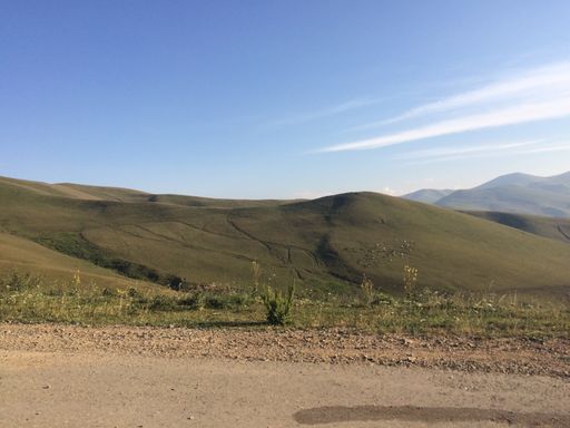 A beautiful view of green hills near Lake Sevan in Armenia
