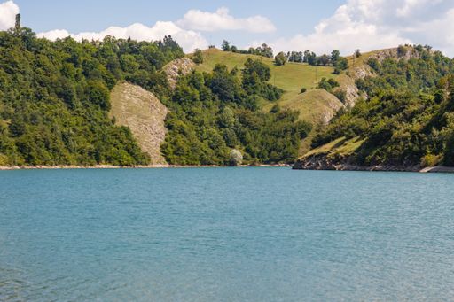 A mesmerizing view of a beautiful mountainous landscape with a calm lake