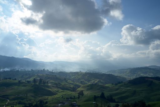 A breathtaking view of the mountain landscape of Vereda el Zancudo in Antioquia under a cloudy sky