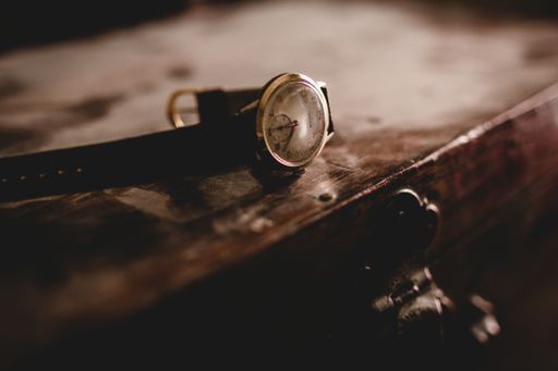 A unique closeup shot of an old brown wrist watch
