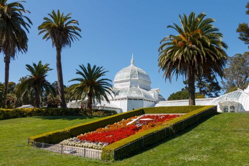 The Conservatory of Flowers in Golden Gate Park, San Francisco, on a clear sunny day