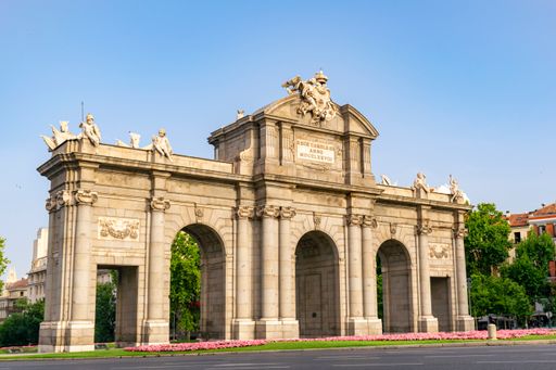 A Beautiful scenery of Puerta de Alcala (Alcala Gate) in Madrid, Spain with clear sky