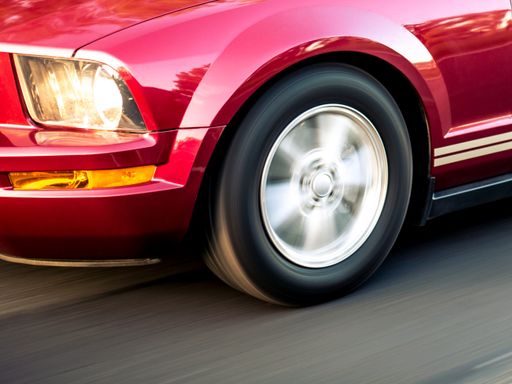 vintage sport car on a asphalt road