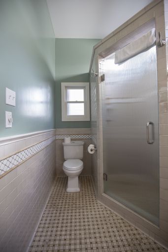 A vertical shot of the inside of a bathroom in a house in New Orleans