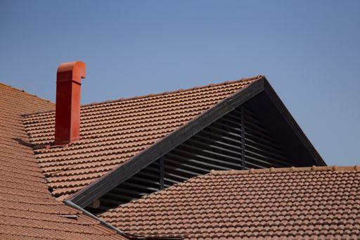 A roof of a house with a pipe on it in Israel