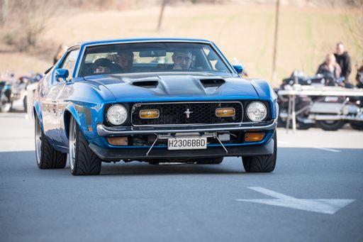 Front view of a nice classic blue facelifted first generation 1971 Ford Mustang Mach