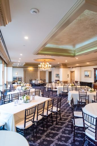 A vertical high angle shot of a wedding hall with an elegant setting