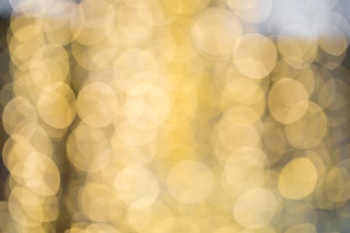 A blurred yellow bokeh light background