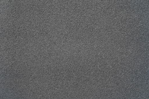 A closeup shot of a gray wall background