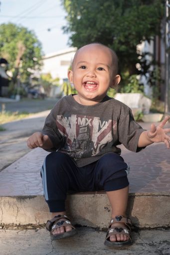 This photo was taken on July 17, 2021 in the afternoon around 4 pm, when Rachma was watching her older brother playing football in front of our house.