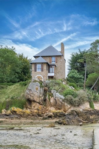 Brehat island in Brittany, old houses in a typical pathway