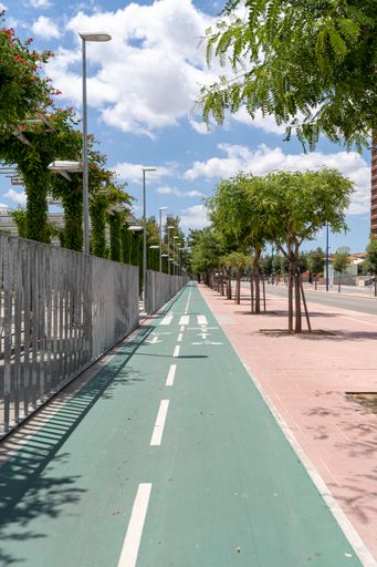 A vertical shot of a bicycle road in the city