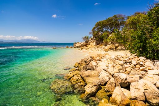 A beautiful shot of the white sand and clear turquoise water of Labadee Island, Haiti