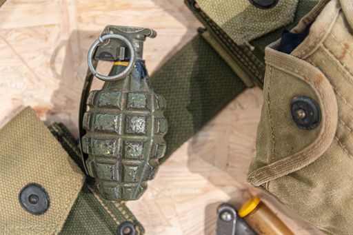 A closeup shot of an ld World War II hand grenade