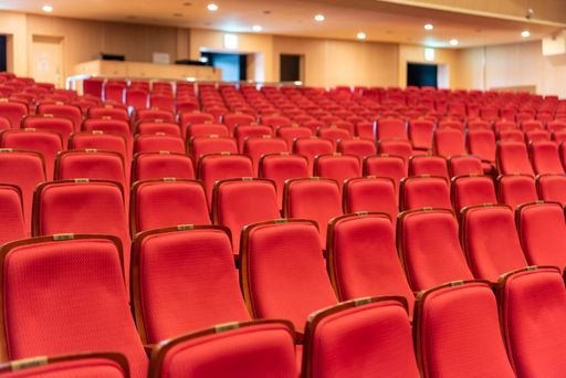 An empty red theater chairs due to coronavirus pandemic