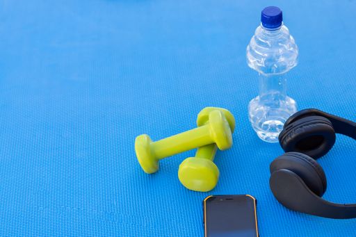weights and fitness training equipment on the gym floor