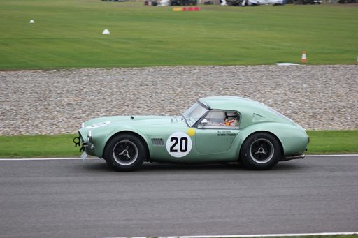 A green 1963 AC Cobra at the Goodwood Revival 2017 during the Royal Automobile Club TT Celebration race
