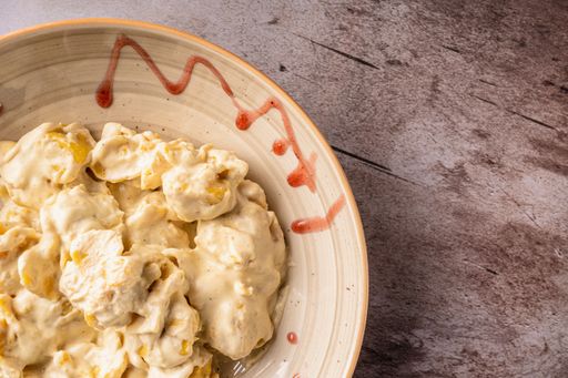 A delicious pear fiocchetti on a wooden table