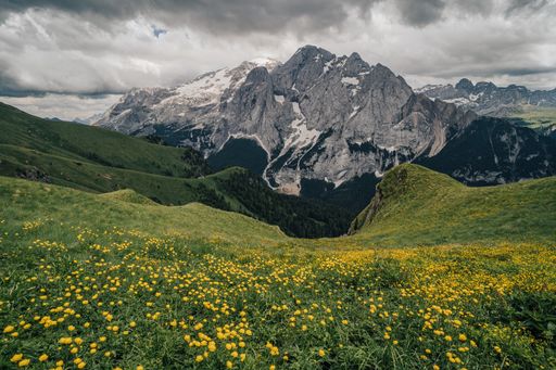 Summer view of Marmolada (Punta Penia), the highest peak in Dolomites, Italy. Alpine landscape of Dolomiti with a view of a glacier on Marmolada.
