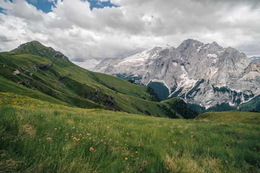 Summer view of Marmolada (Punta Penia), the highest peak in Dolomites, Italy. Alpine landscape of Dolomiti with a view of a glacier on Marmolada.
