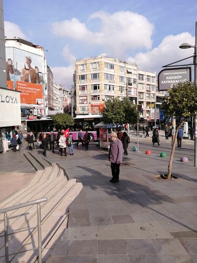 A vertical shot of a busy day in Karakoy Square in Istanbul, Turkey