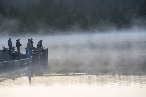Fishermen on Spruce Knob Lake in Monongahela National Forest, Randolph County, WV photographed at sunrise in October of 2017.
