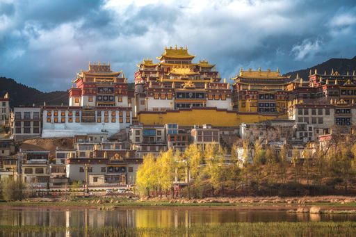 A landscape of Shangri-La City under a cloudy sky in the daytime in China