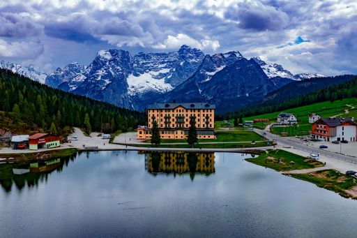 A Famous building on Lago di Misurina with the dolomites in the backdrop, Misurina, Italy
