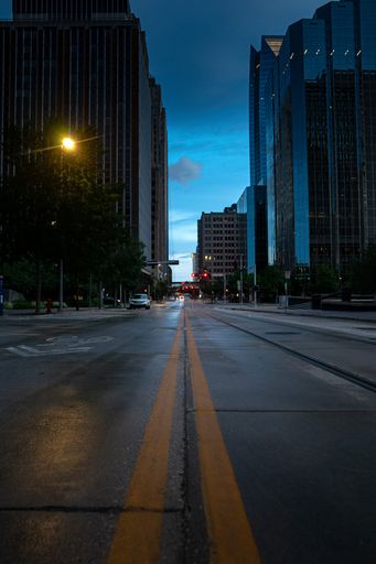 A vertical shot of sleeping Oklahoma city downtown and empty streets