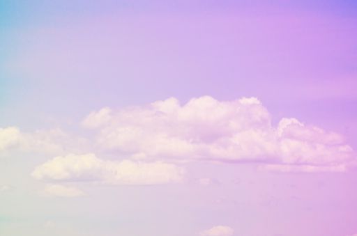 A beautiful view of sky and clouds in pastel tones - perfect for background or wallpaper