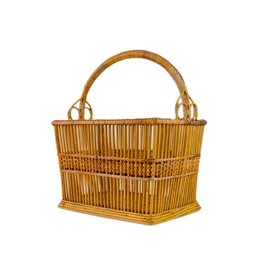 A vertical shot of a wooden basket isolated on a white background