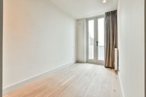 An unfurnished residential apartment in bright colors