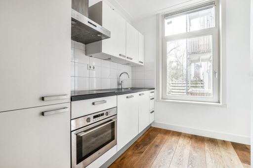 A modern kitchen interior in bright colors