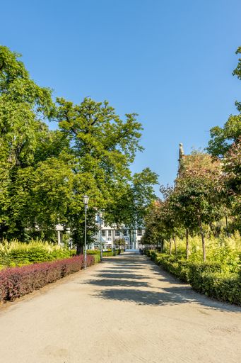 A vertical shot of a green park square in Sopot, Portugal