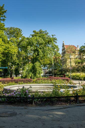 A vertical shot of a green park square in Sopot, Portugal