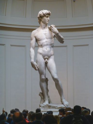 A vertical shot of a statue of a man in Florence, Italy