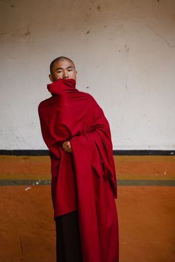 Young Buddhist monk at Punakha Tshechu festival in Bhutan